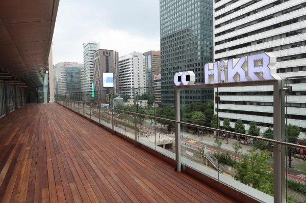 This terrace overlooking Cheonggyecheon Stream in Seoul is on the fifth floor of HiKR Ground.