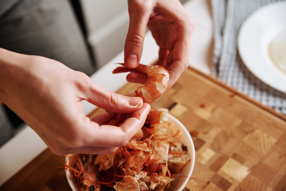 Another debate is about a boy- or girlfriend peeling shrimp for a friend. (Courtesy of gettyimagesbank)
