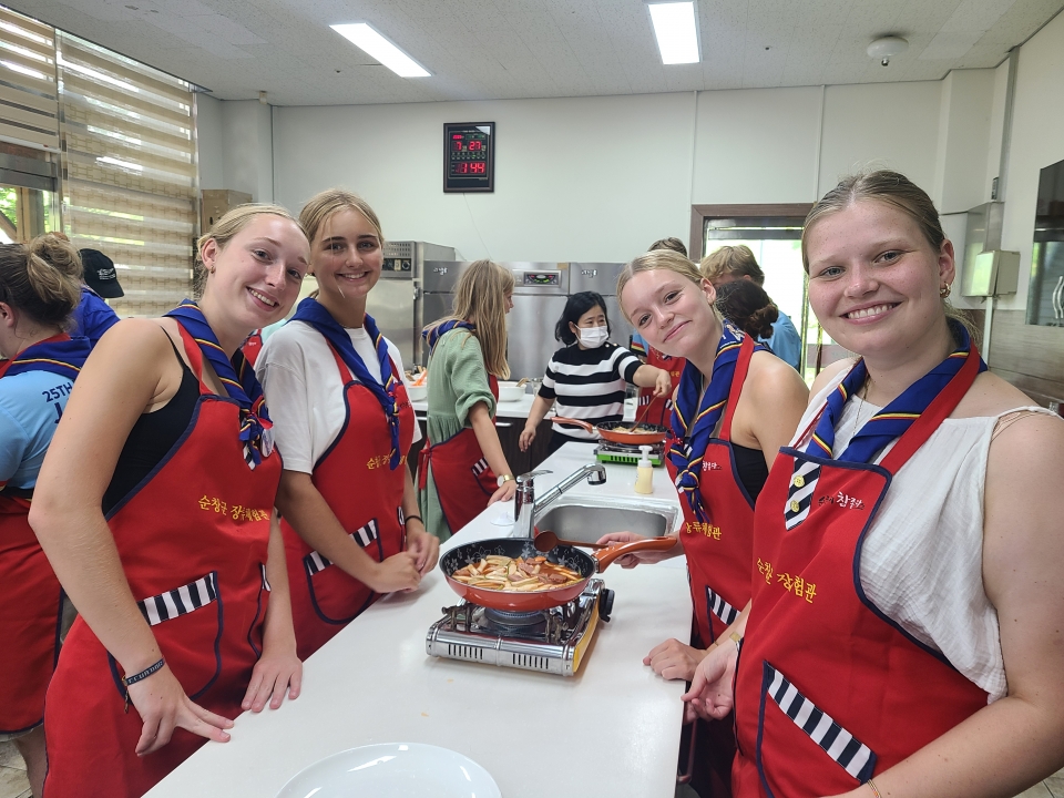 Belgian scouts attending the 25th World Scout Jamboree in Saemangeum this year make tteokbokki (spicy rice cake) on July 27 at Sunchang-gun County, Jeollabuk-do Province, ahead of the jamboree. (Jeollabuk-do Provincial Office)